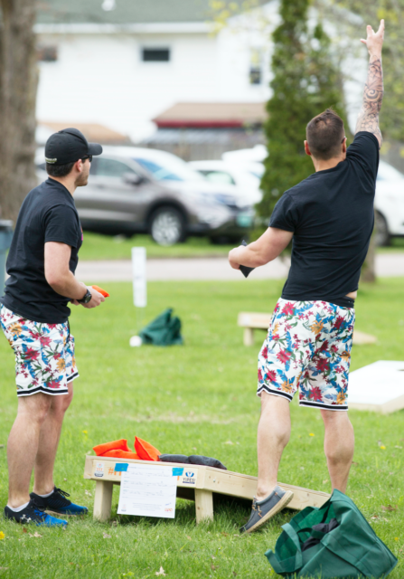 Men playing Cornhole